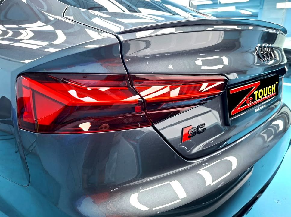 Close-up of the Audi S5 tail light and boot lid with the S5 badge.
