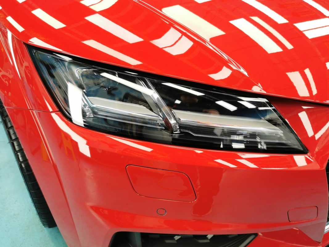 The TT Coupe's coated paintwork showing clean reflections.