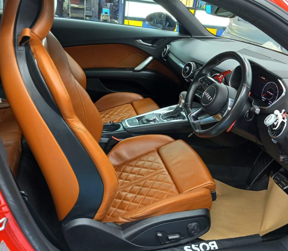 The Audi TT parked in the workshop, freshly coated.