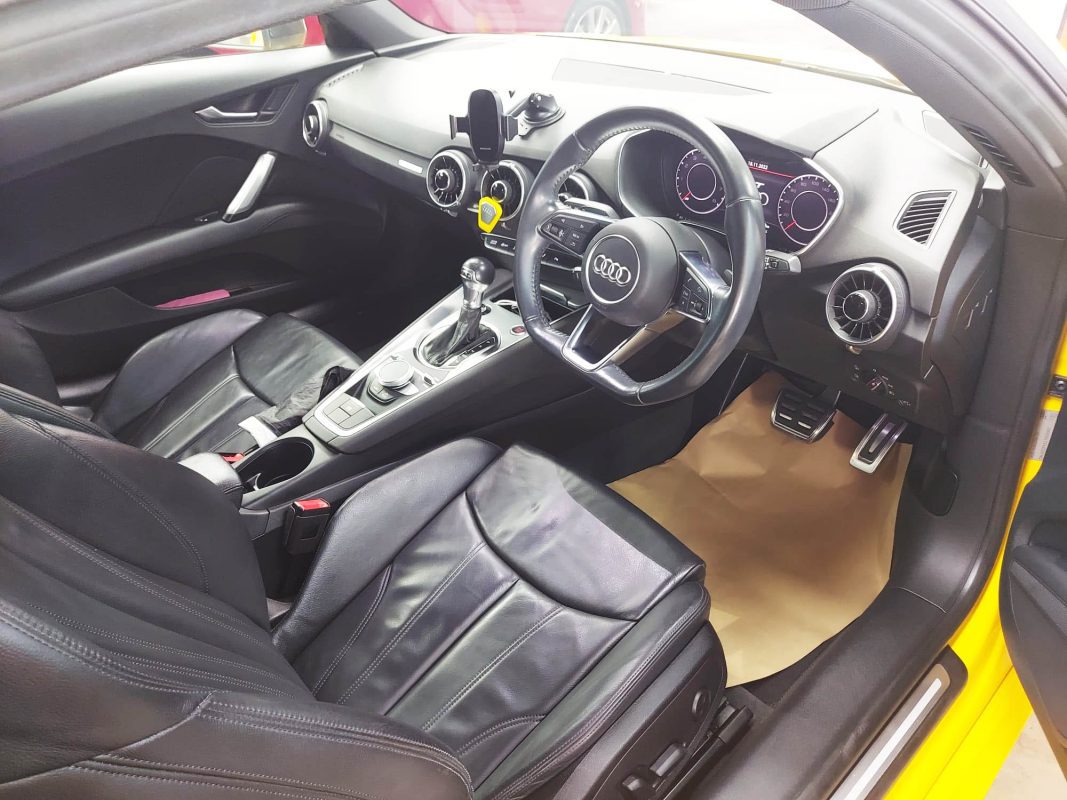 The Audi TT parked in the workshop, freshly coated.