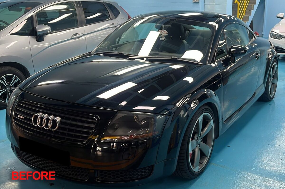 Black Audi TT Coupe, glossy after its full respray.