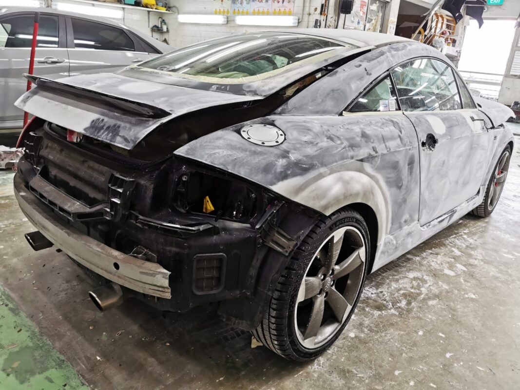 The Audi TT stripped to bare panels and primer, ready for body work.