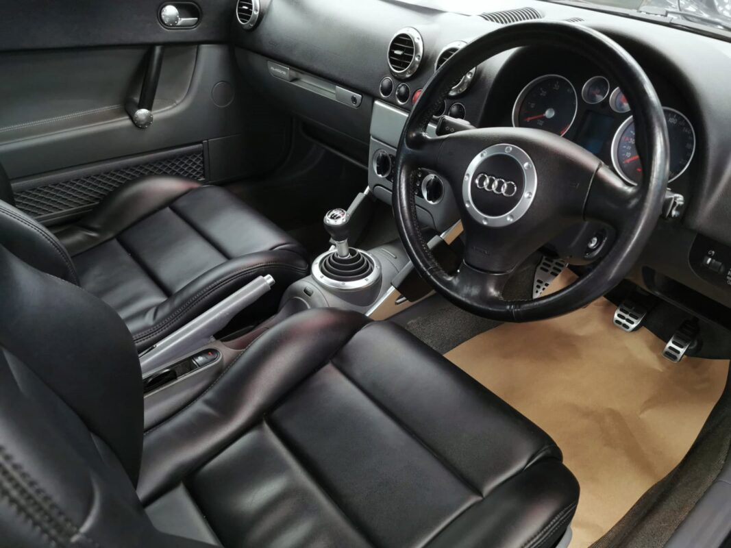 The black interior of the Audi TT, cleaned and detailed.