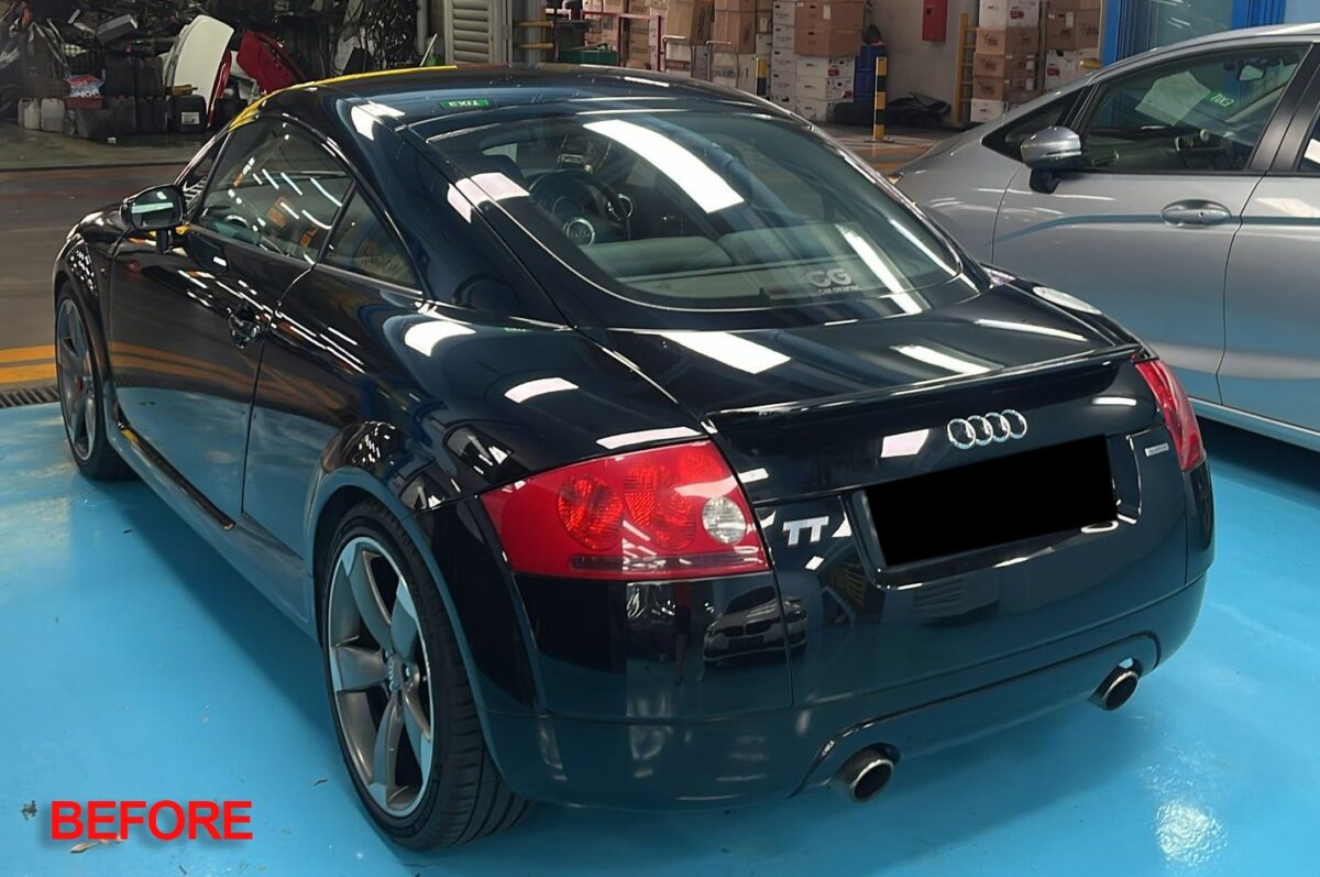 Before: the Audi TT's rear three-quarter at the start, paintwork tired.