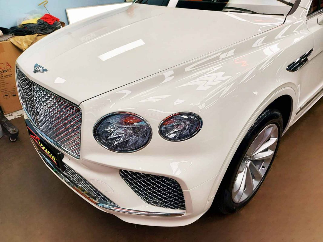 The Bentley Bentayga V8 from a side angle after the ceramic coating.