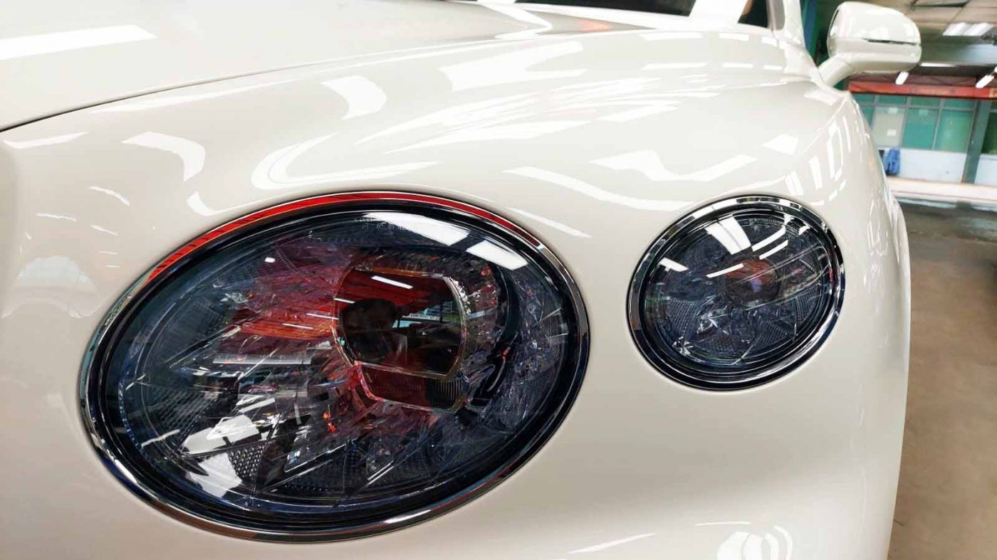 The Bentayga's coated paintwork showing clean reflections.