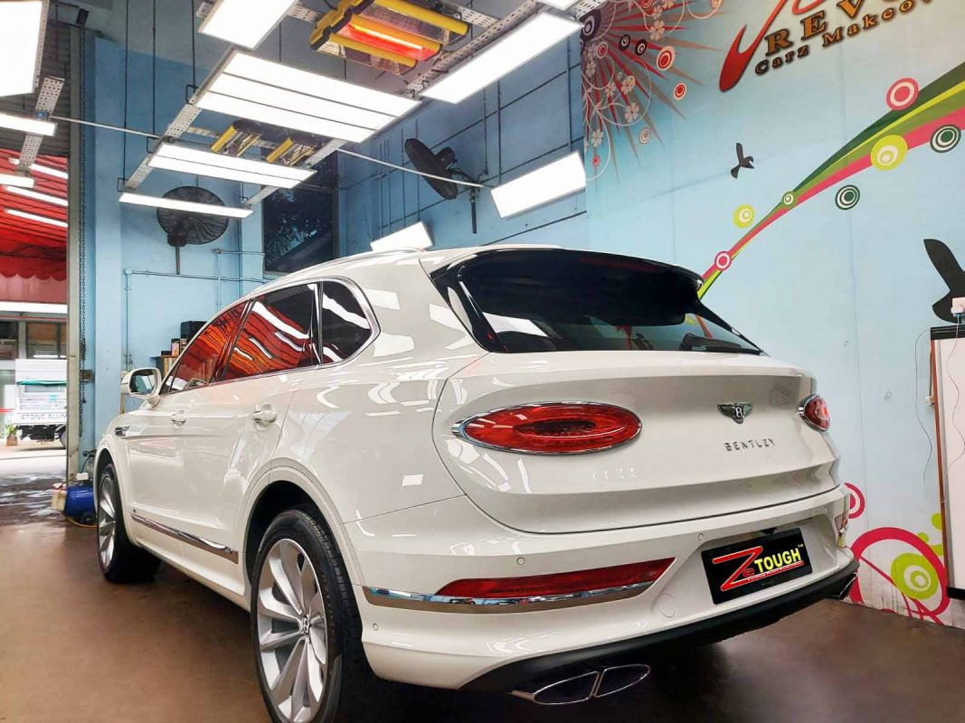 Rear quarter of the Bentley Bentayga V8, glossy and protected.