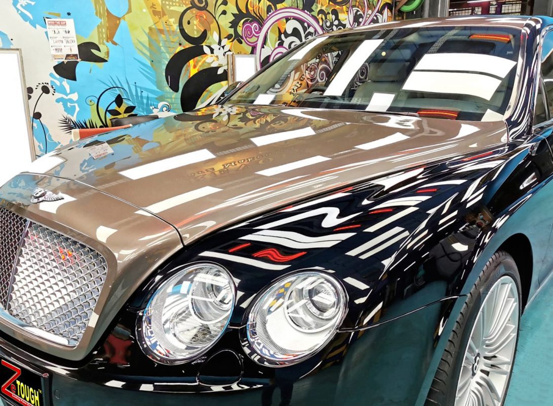 The Bentley Continental from a side angle after the ceramic coating.
