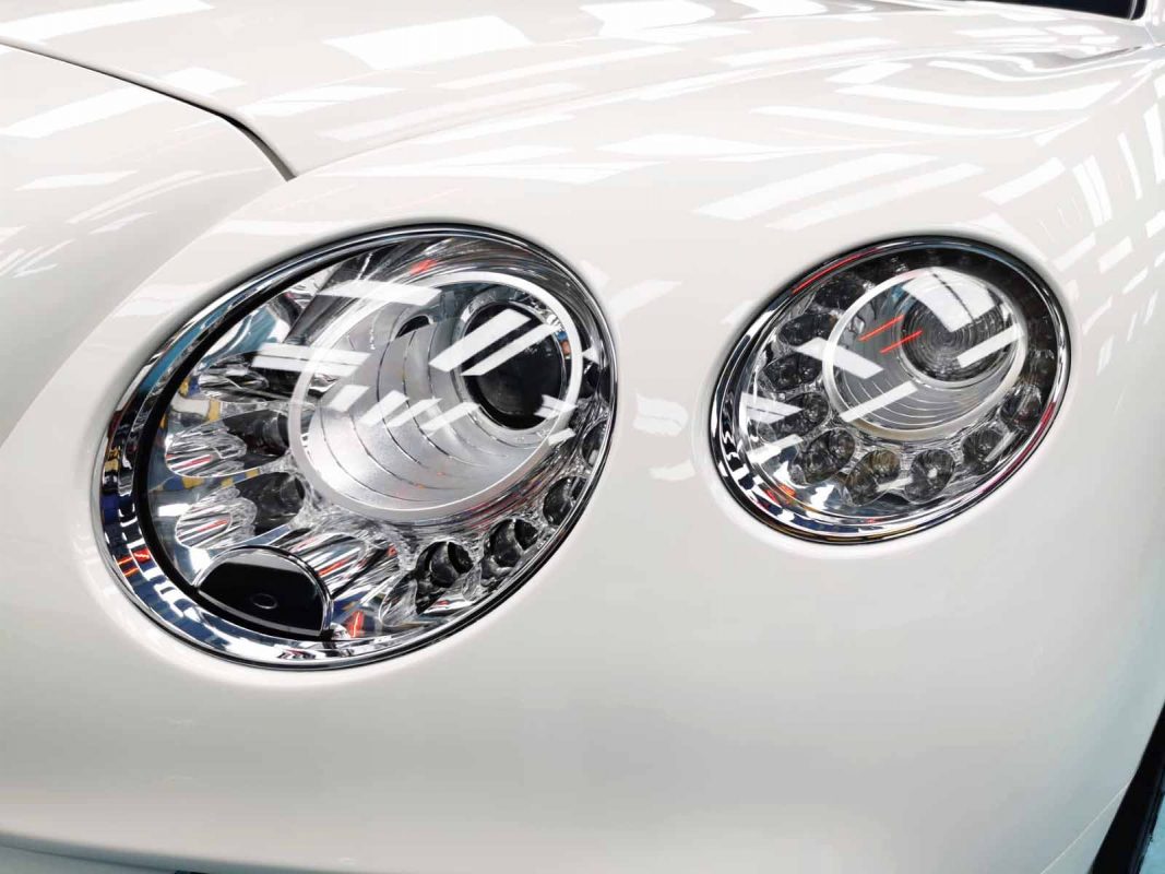 The Continental's coated paintwork holding clean reflections.