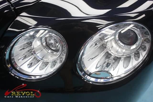 The Flying Spur's coated paintwork showing clean reflections.