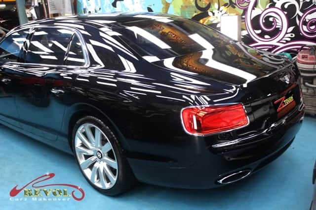 The Bentley Flying Spur W12 parked in the workshop, freshly coated.