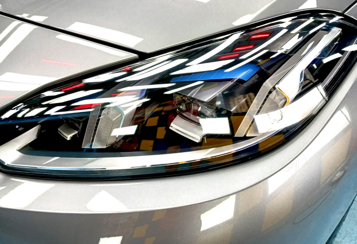 The 1 Series' coated paintwork showing clean reflections.