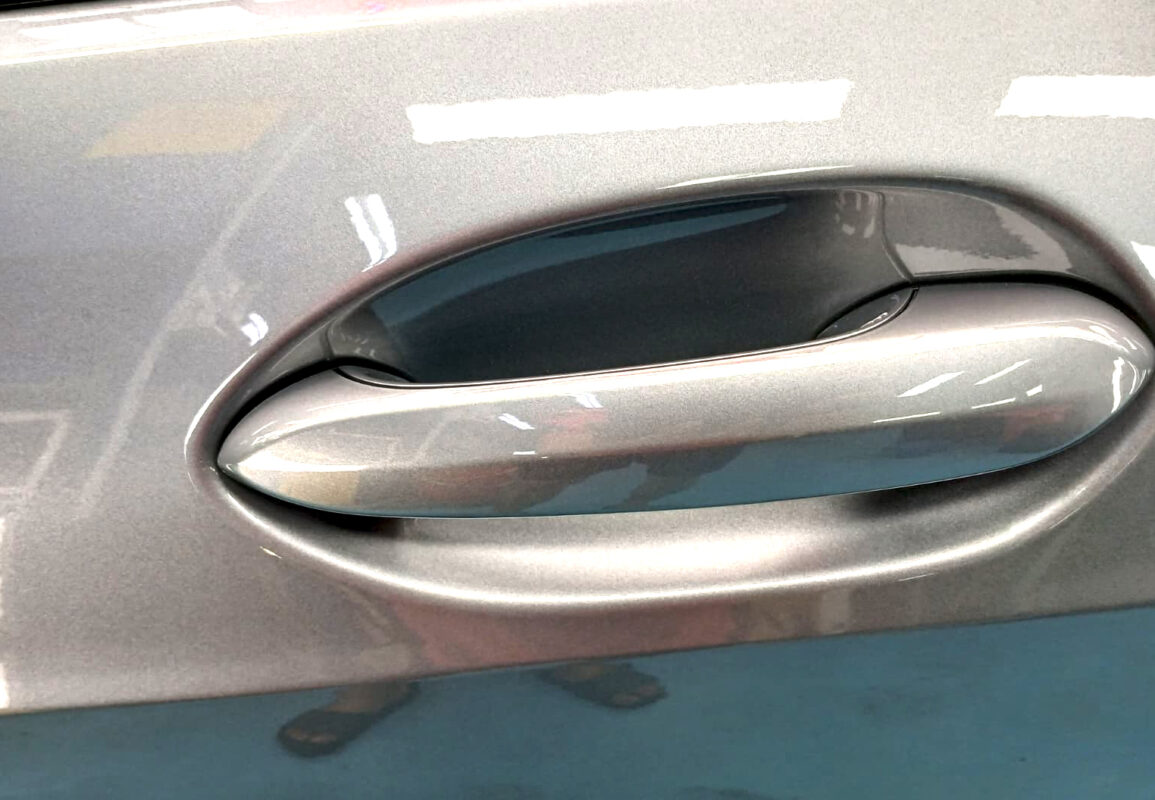 Front three-quarter view of the BMW 1 Series after coating.