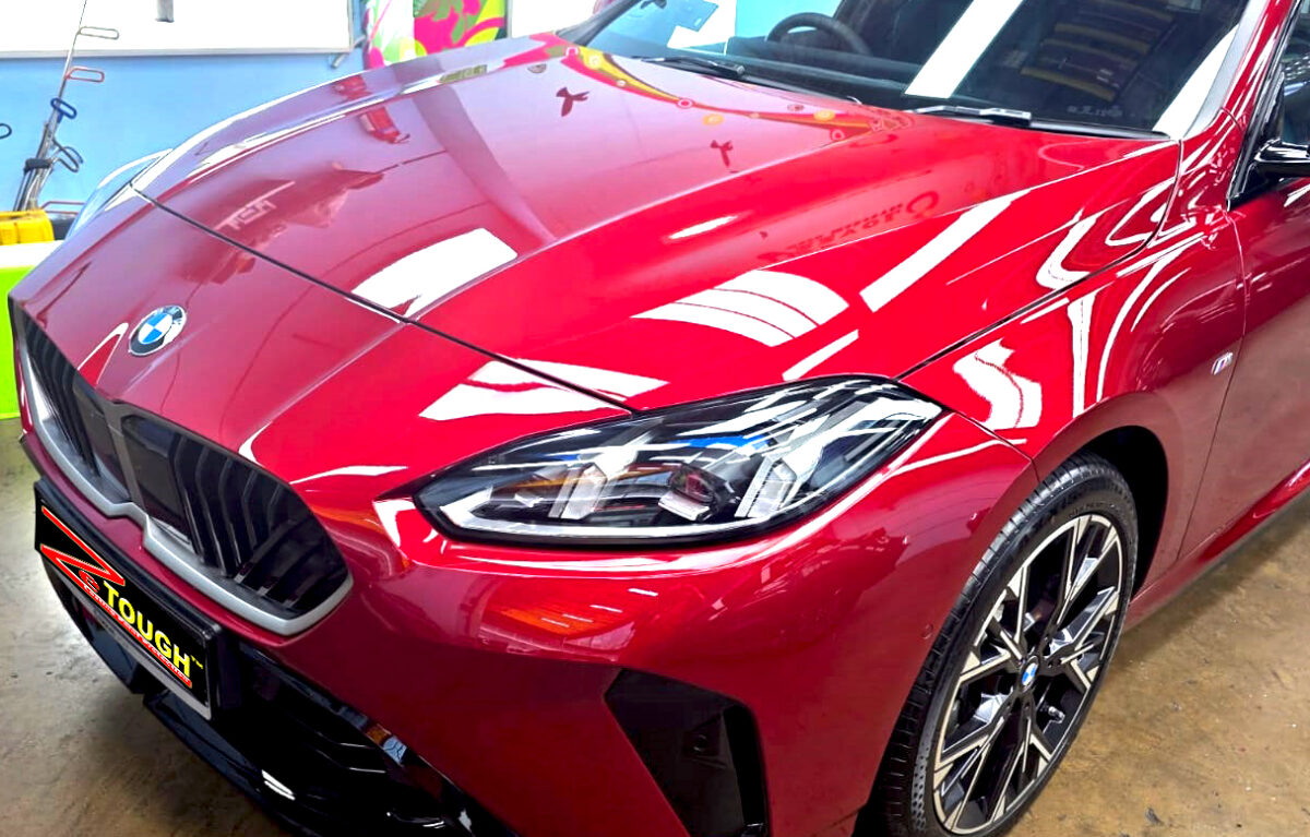 The BMW 1 Series from a side angle after the ceramic coating.