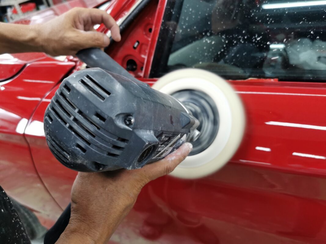 A freshly painted panel on the BMW 1 Series, the coat still curing in the booth.