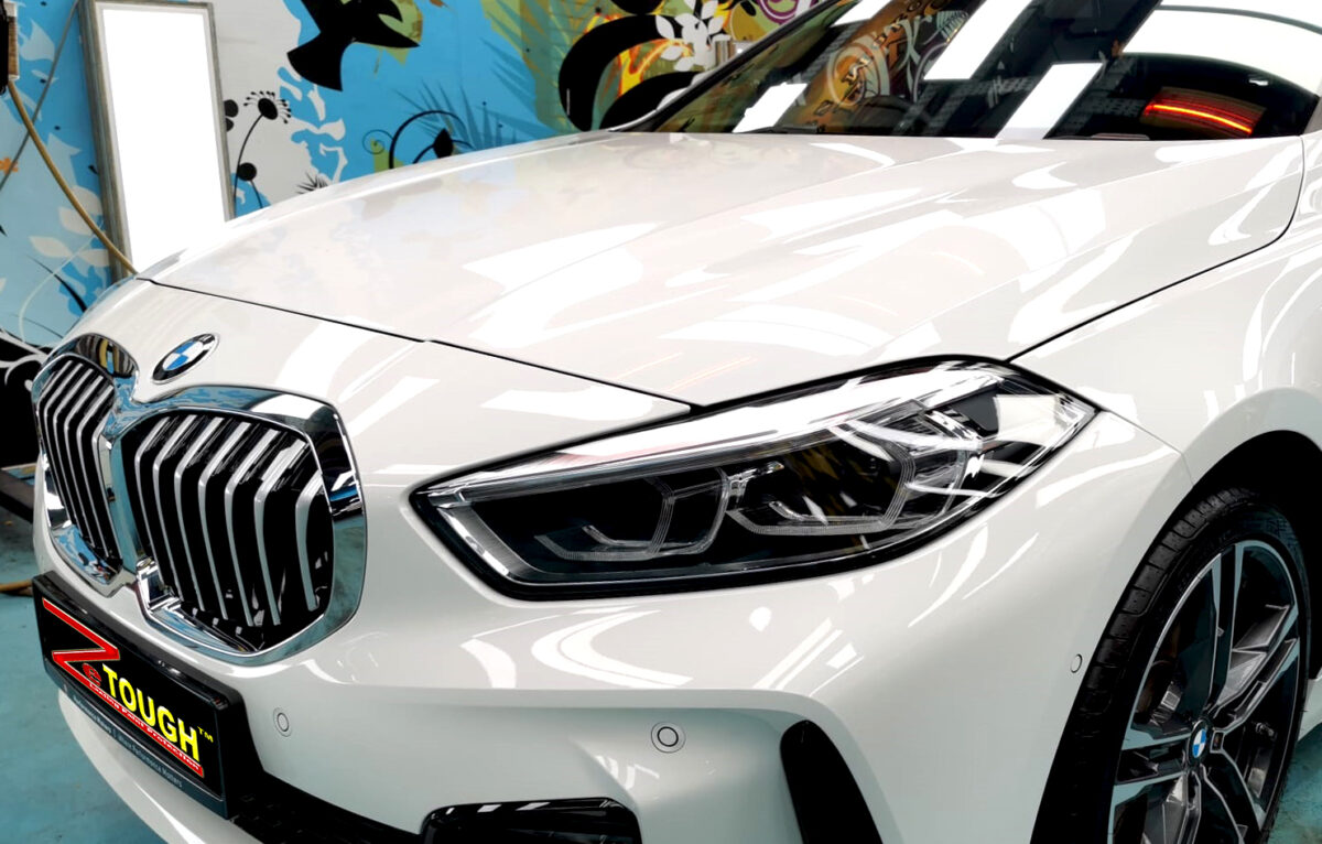 The BMW 1 Series from a side angle after the ceramic coating.