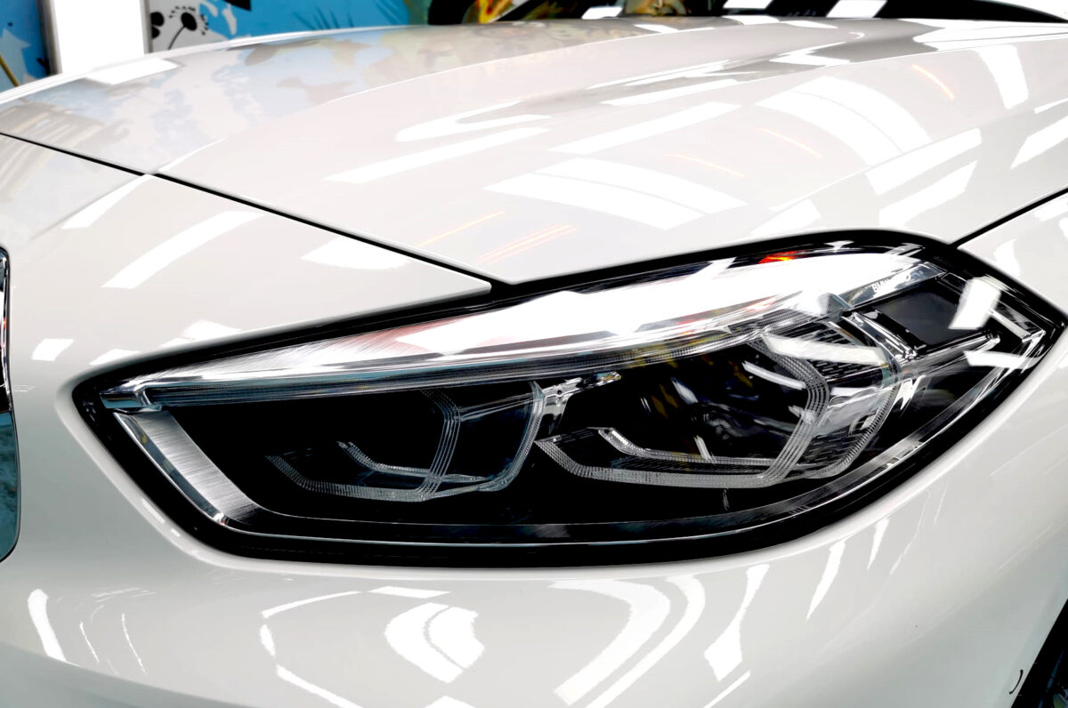 The 1 Series's coated paintwork showing clean reflections.