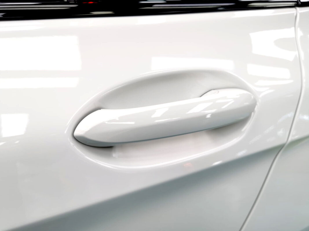 Front three-quarter view of the BMW 1 Series after coating.