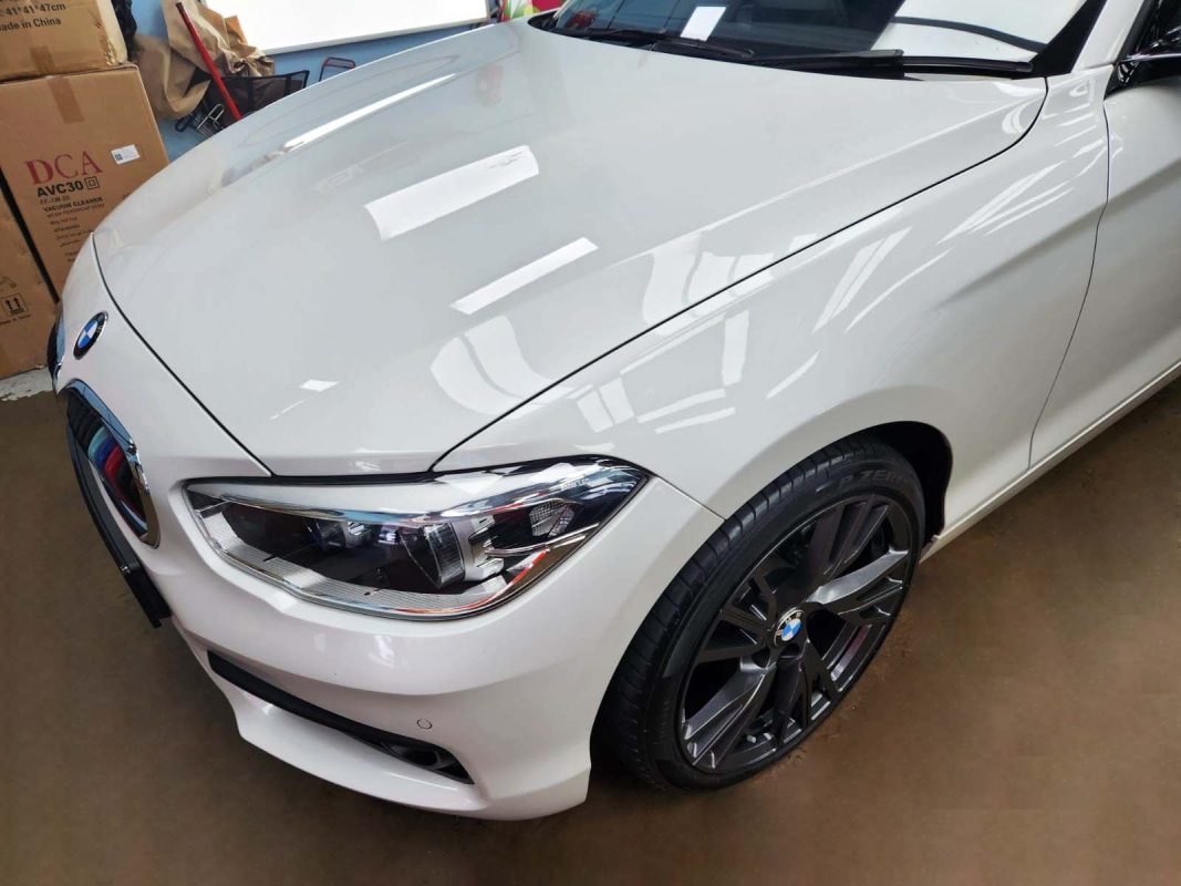 The BMW 116d from a side angle after the ceramic coating.