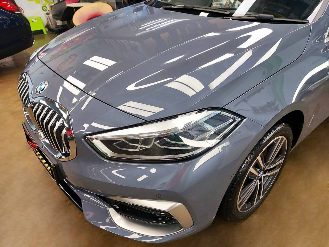 The BMW 116i from a side angle after the ceramic coating.