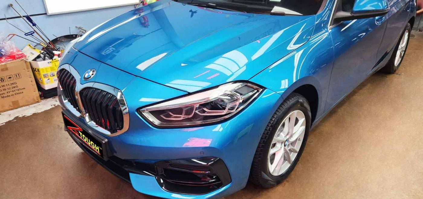 The BMW 116i from a side angle after the ceramic coating.