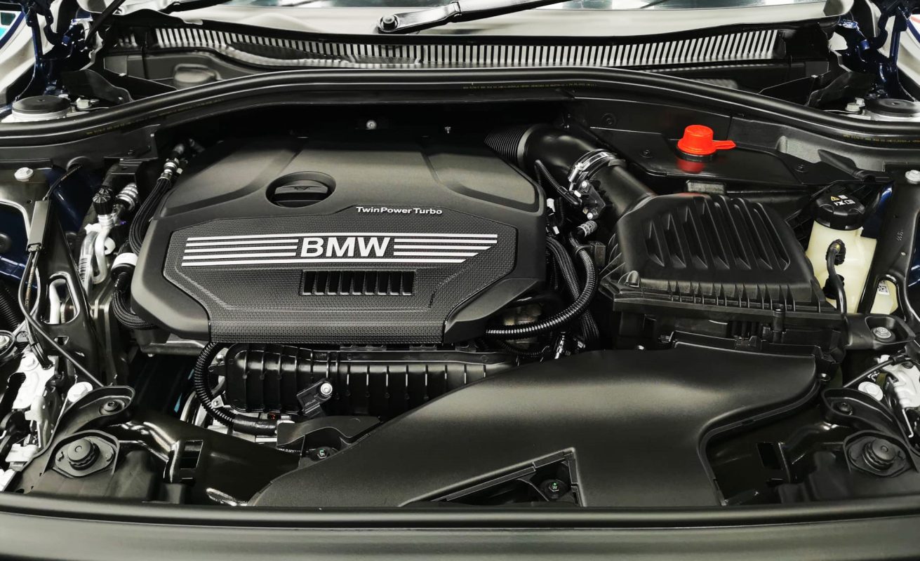 Front three-quarter view of the BMW 116i after coating.