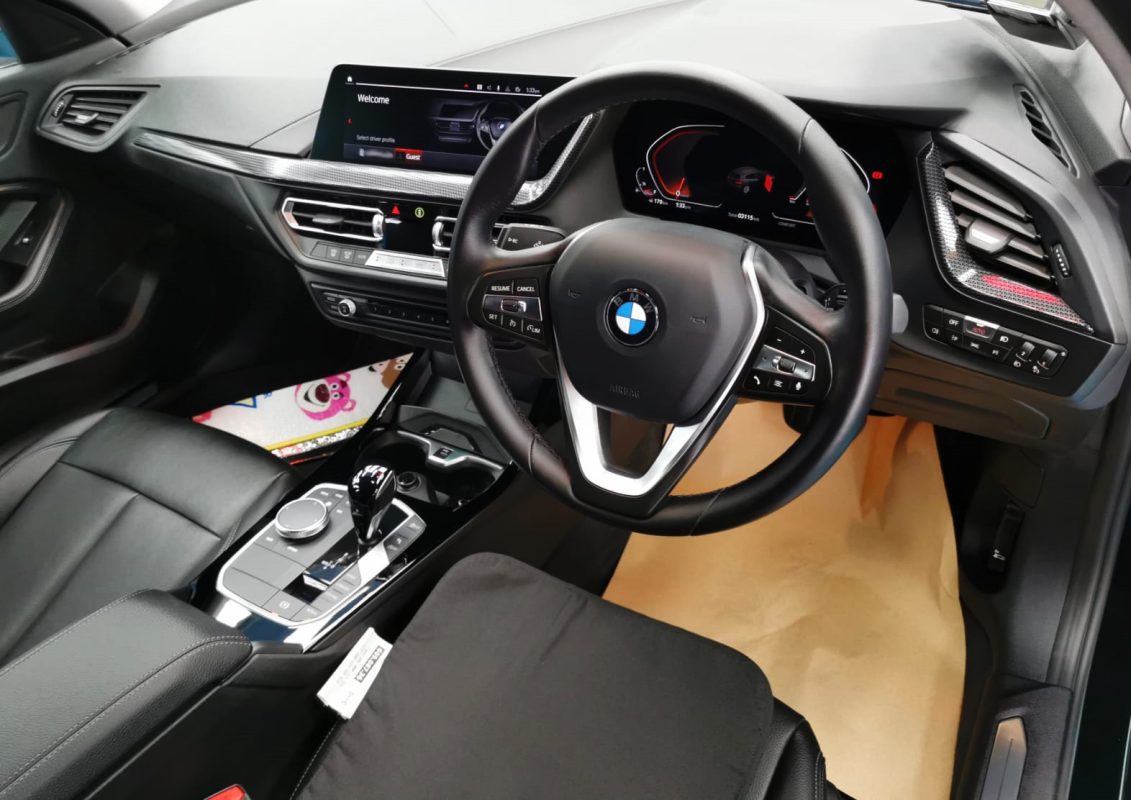 Front three-quarter view of the BMW 116i after coating.