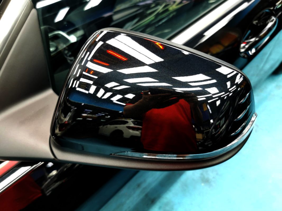 Side panel of the BMW 116i with the protective finish locked in.
