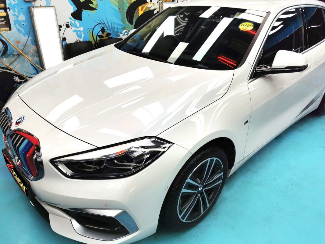 The BMW 116i from a side angle after the titanium coating.