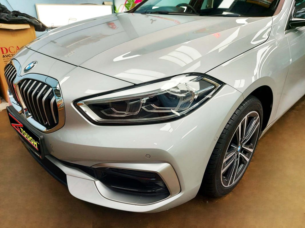 The BMW 118 from a side angle after the ceramic coating.