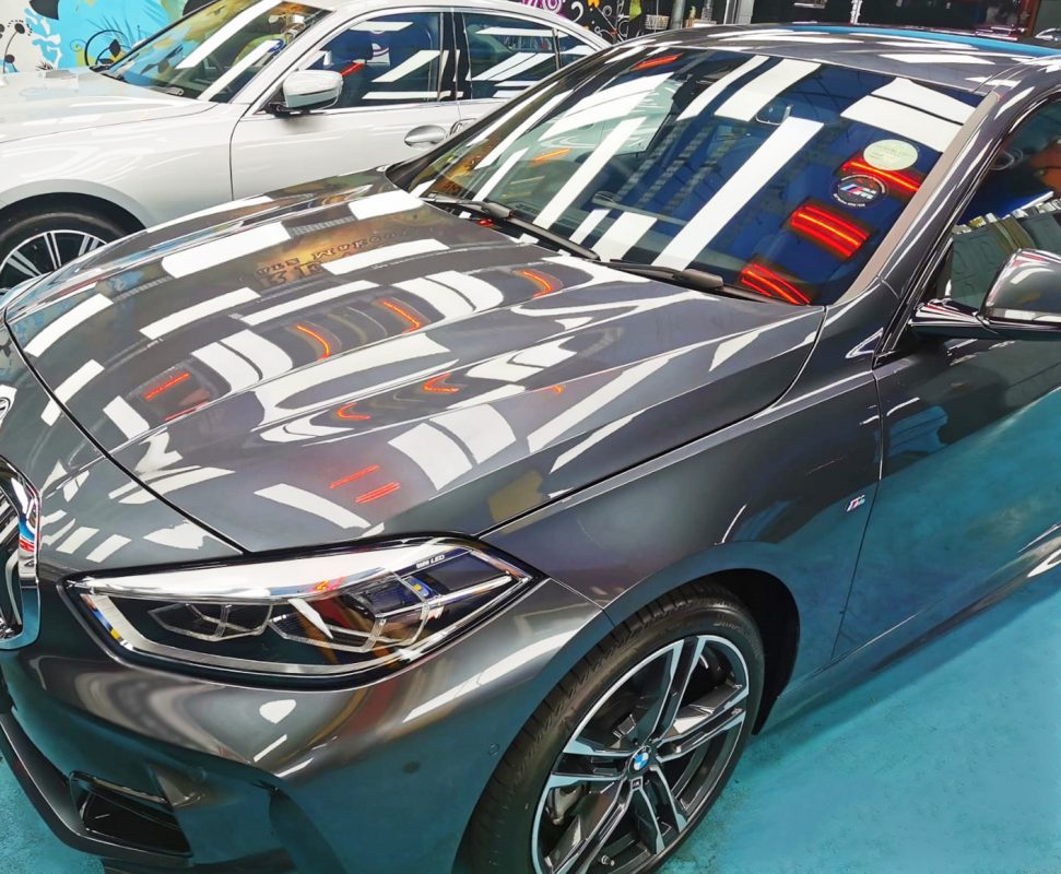 The BMW 118i from a side angle after the ceramic coating.