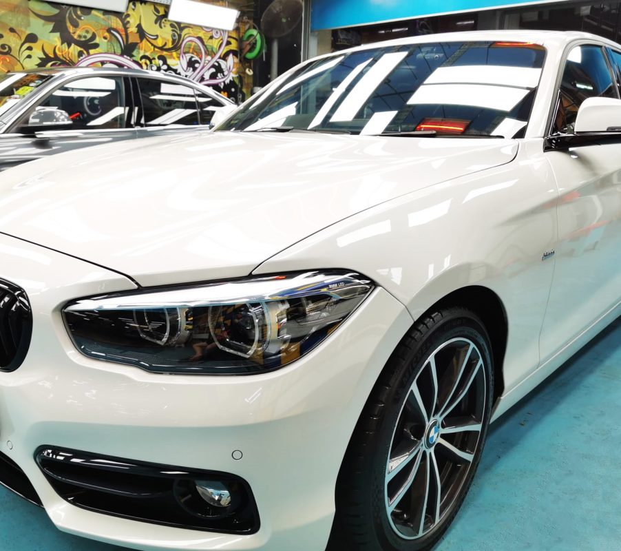 The BMW 118i from a side angle after the ceramic coating.