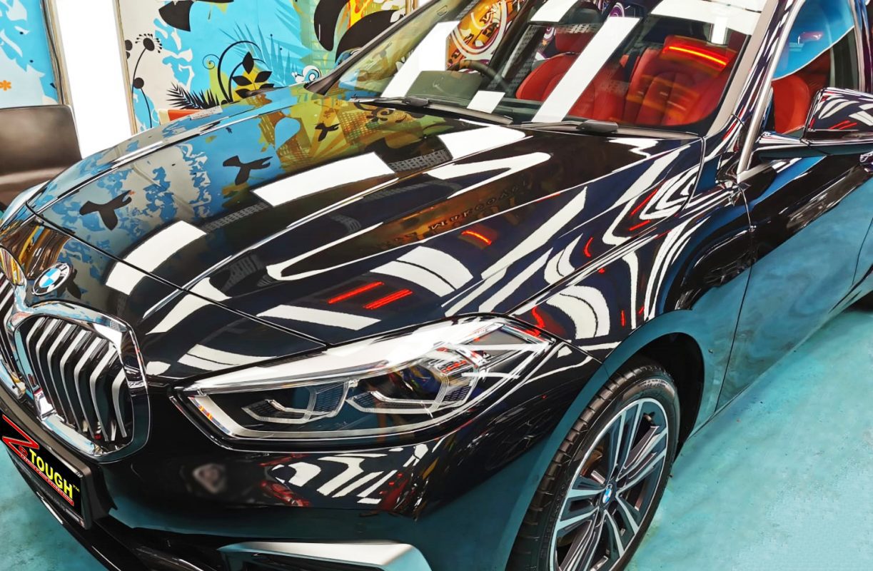 The BMW 118i from a side angle after the titanium coating.