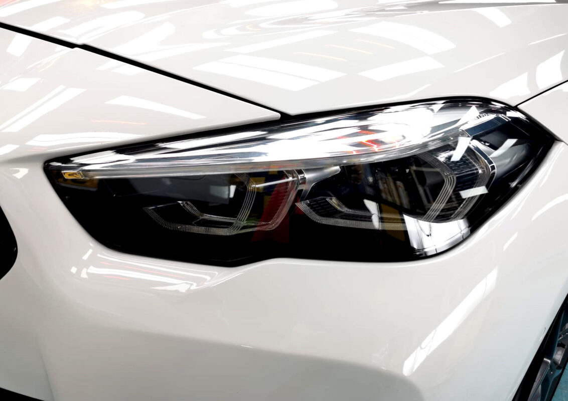 The 2 Series' coated paintwork showing clean reflections.