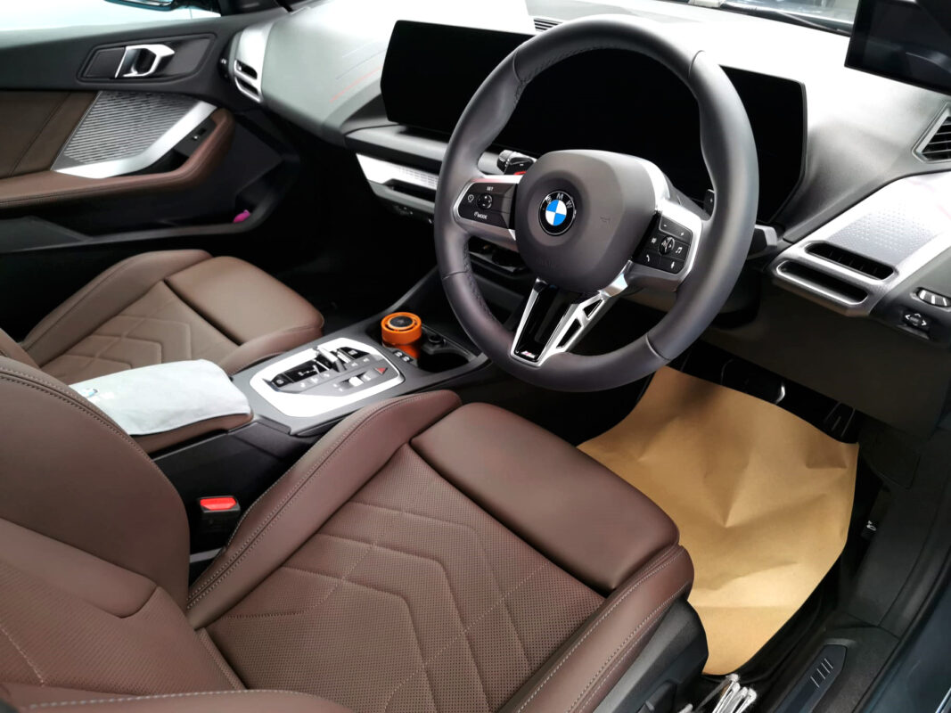 Front three-quarter view of the BMW 2 Series after coating.