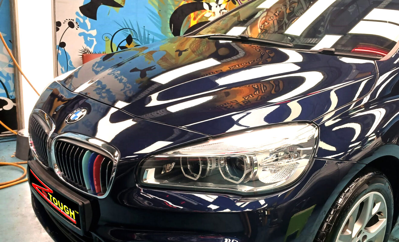 The BMW 2 Series from a side angle after the titanium coating.