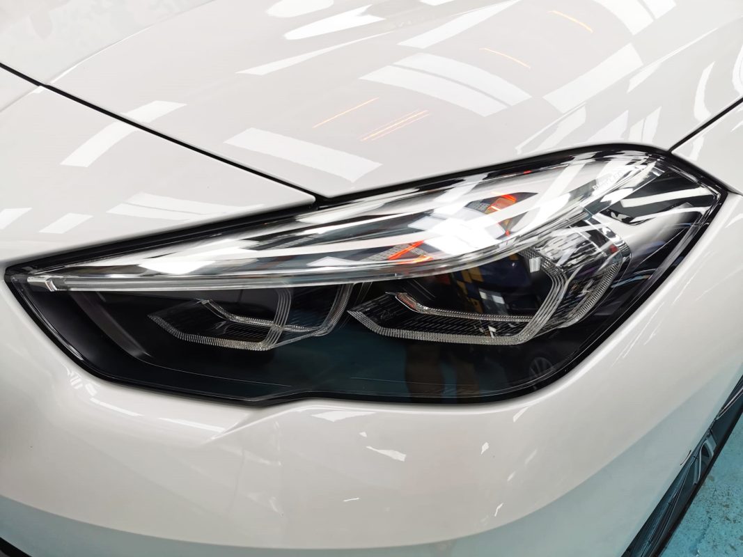 The 2 Series' coated paintwork showing clean reflections.