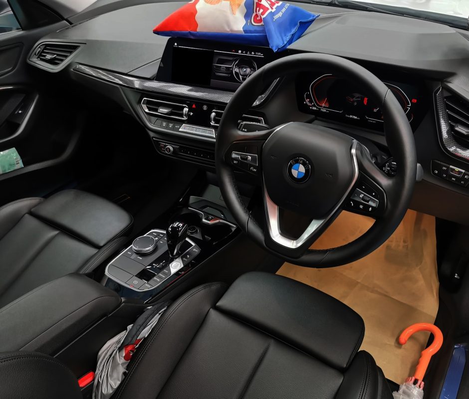 The BMW 2 Series parked in the workshop, freshly coated.