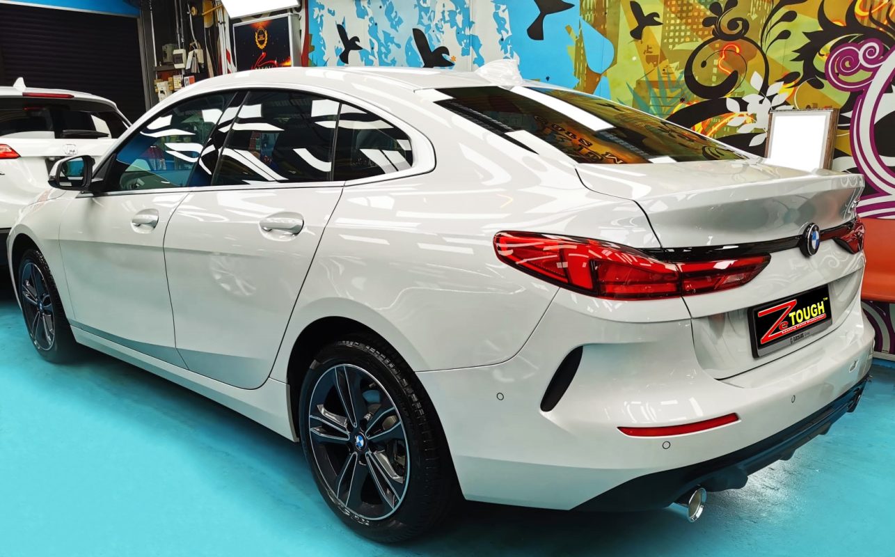 Rear quarter of the BMW 2 Series, glossy and protected.