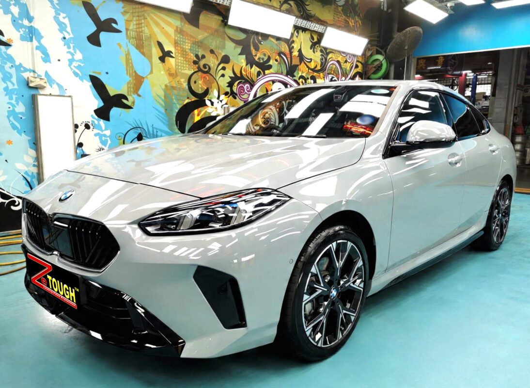 The BMW 2 Series's coated paintwork under workshop lighting.