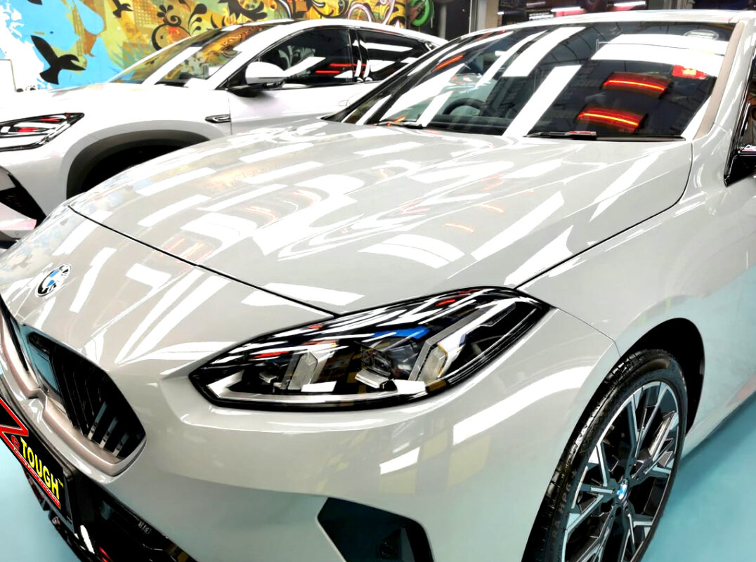 The BMW 2 Series's coated paintwork under workshop lighting.
