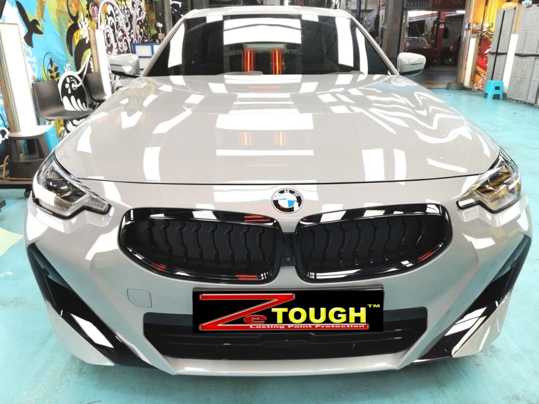 The BMW 2 Series's coated paintwork under workshop lighting.