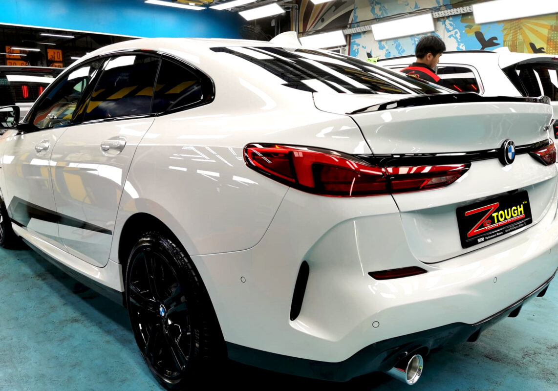 Rear quarter of the BMW 2 Series, glossy and protected.