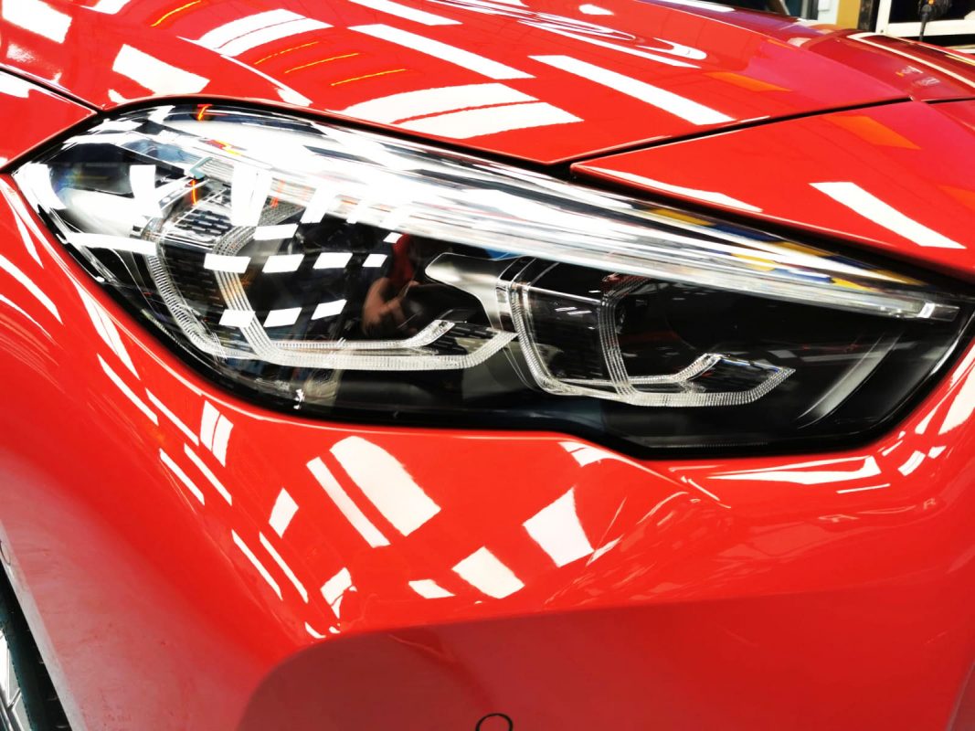 The 2 Series' coated paintwork showing clean reflections.
