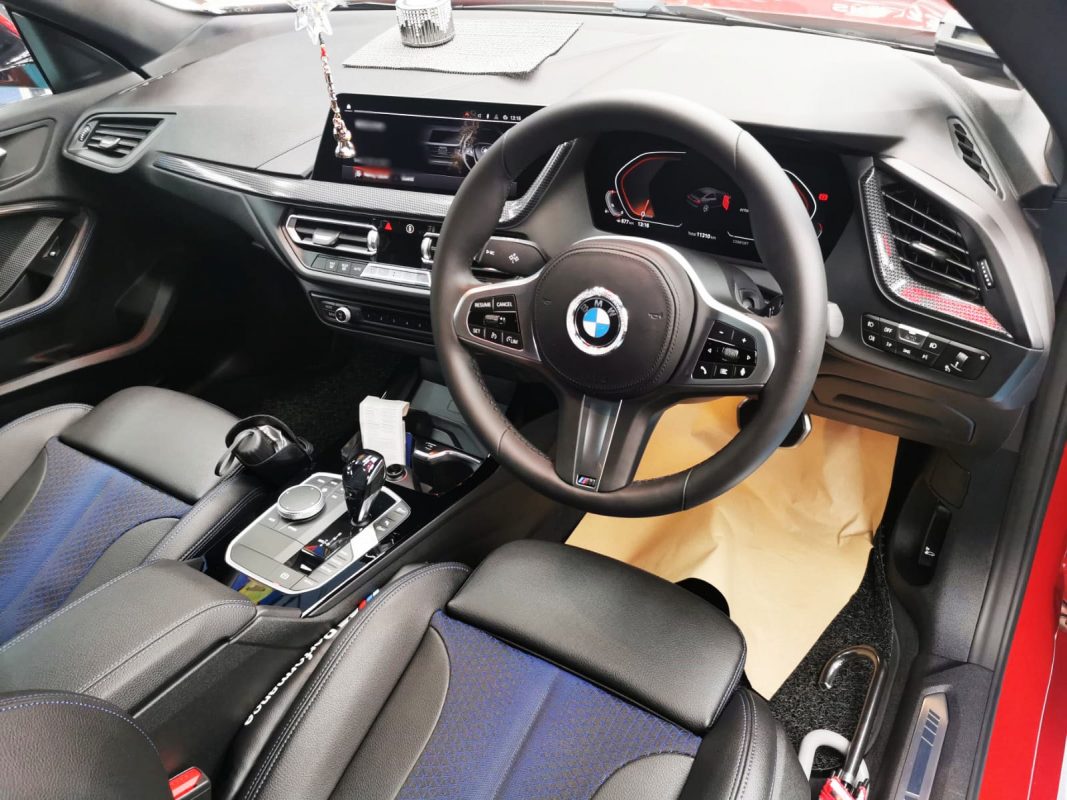 The BMW 2 Series parked in the workshop, freshly coated.