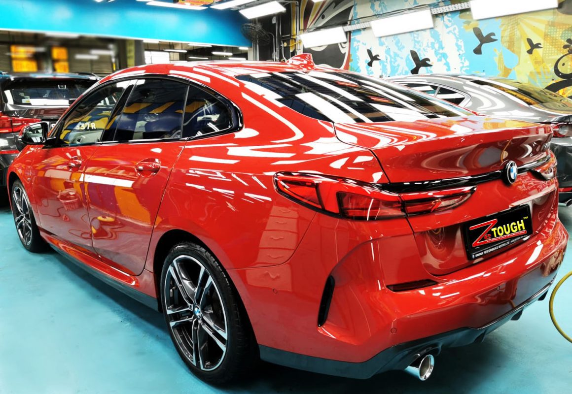 Rear quarter of the BMW 2 Series, glossy and protected.