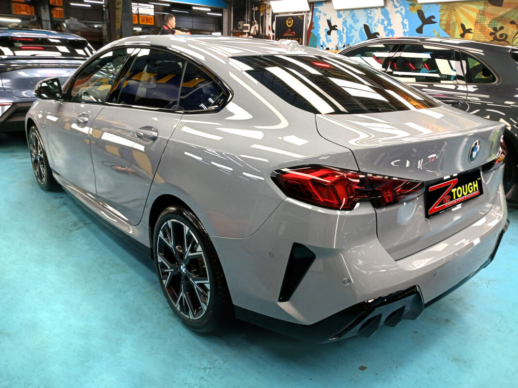 Rear quarter of the BMW 2 Series, glossy and protected.
