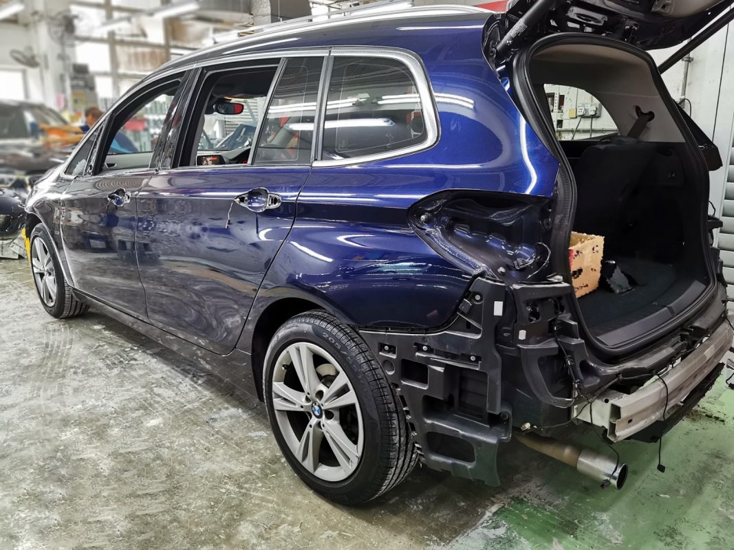 Parts being dismantled from the BMW 2 Series before prep work.