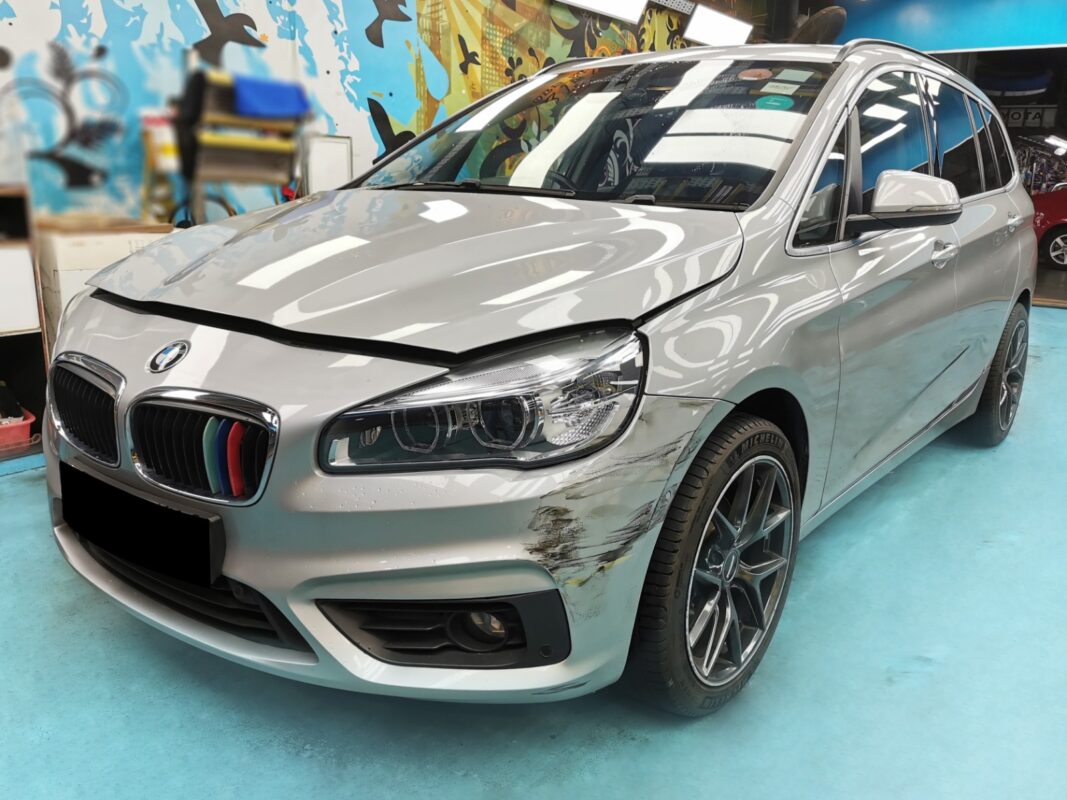 The silver BMW 2 Series as it arrived at Revol Carz, before the respray.