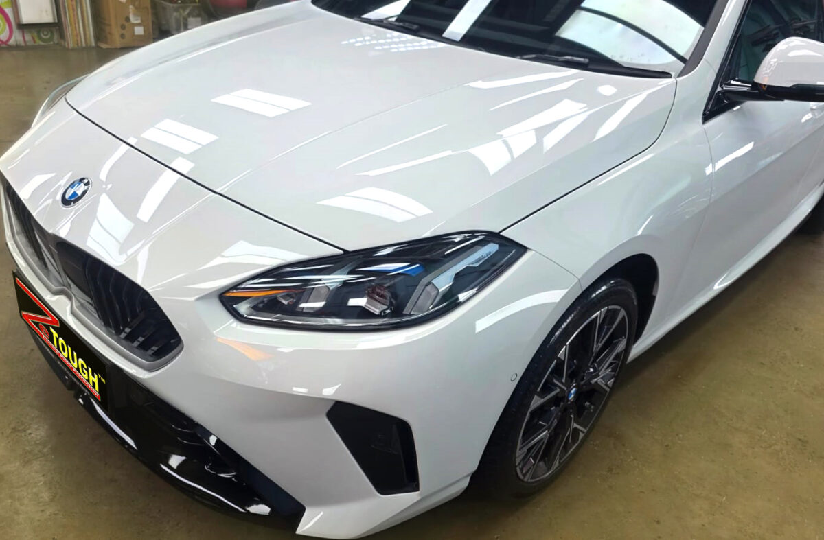 The BMW 2 Series from a side angle after the ceramic coating.